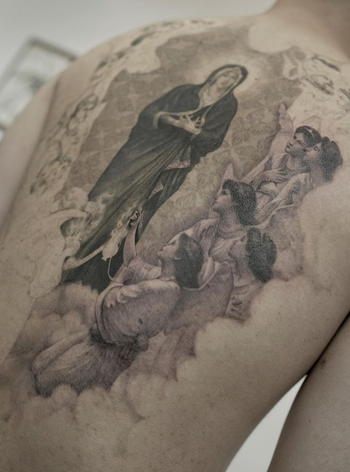 The Virgin Mary Realism Tattoo